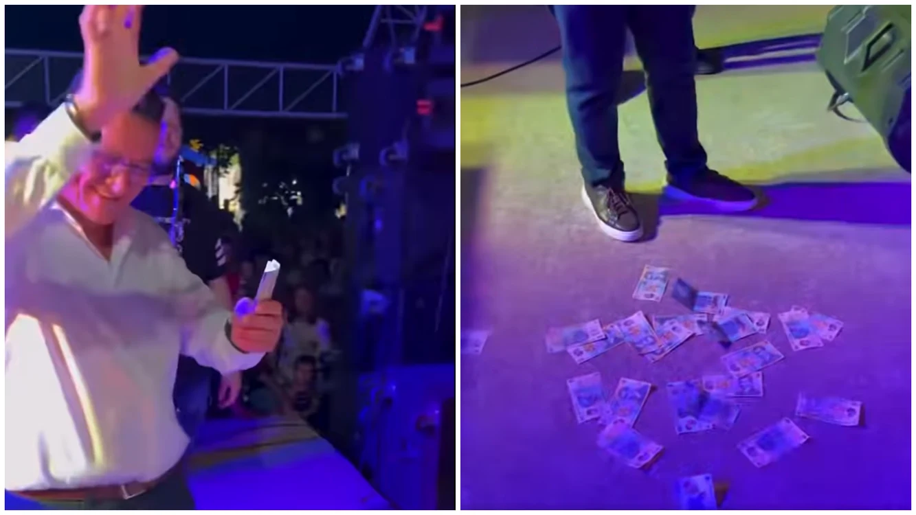 Primarul s-a apărat spunând că erau bani din buzunarul său. FOTO: captură video Facebook