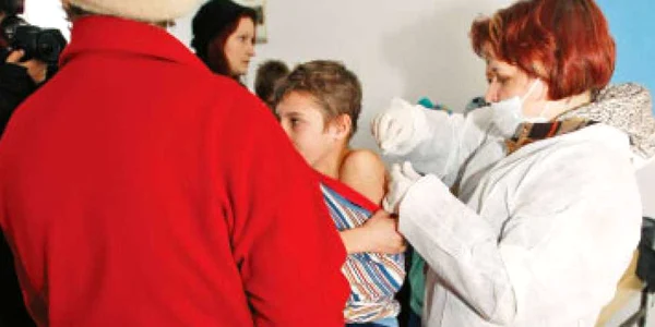 Gripa porcină ar putea lovi cel puţin patru milioane de români
