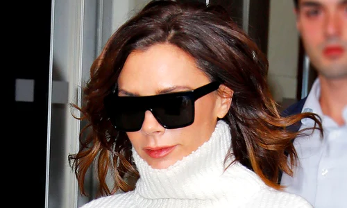 Victoria Beckham out and about in a white turtleneck sweater and tartan patterned trousers in New York jpeg