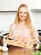 smiling woman with salmon jpg
