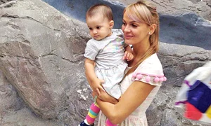 Soţia Anca şi fetiţa  Iulia Andreea sunt  comorile fundaşului  dinamovist jpeg