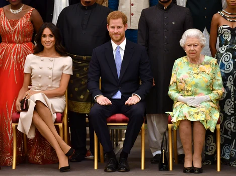 Regina Elisabeta cu Prințul Harry și Meghan Markle. FOTO: Getty Images