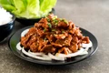 Tocanita asiatica cu friptura de porc  Sursa foto shutterstock 704799211 jpg