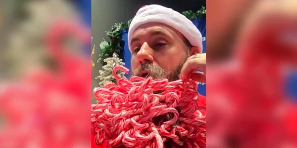 Record. Un american și-a prins în barbă 187 de batoane de acadea. FOTO ndtv.com