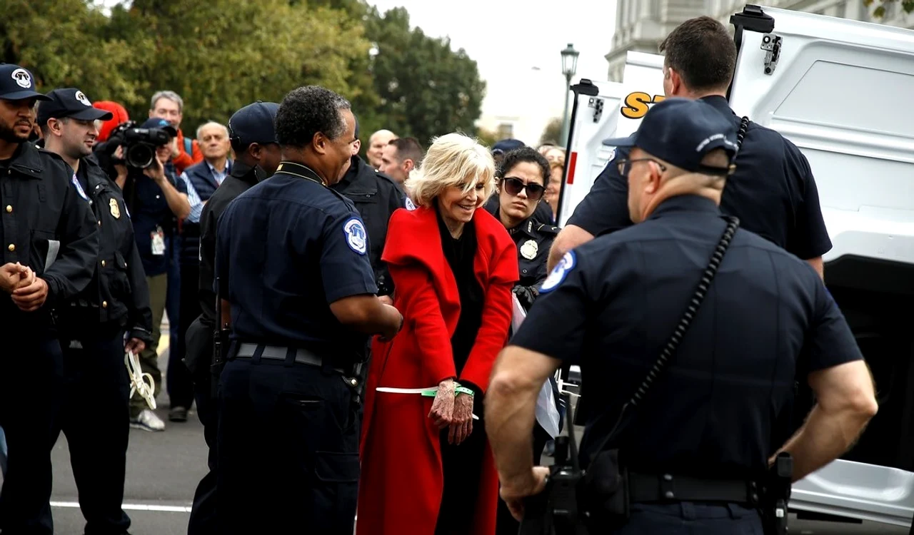 jane fonda accepts award while being arrested 05 jpg jpeg