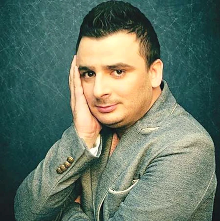 
    Liviu Guţă  