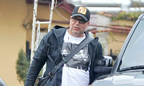 Cosmin Olăroiu  a pus câteva  kilograme de când e plecat din ţară jpeg