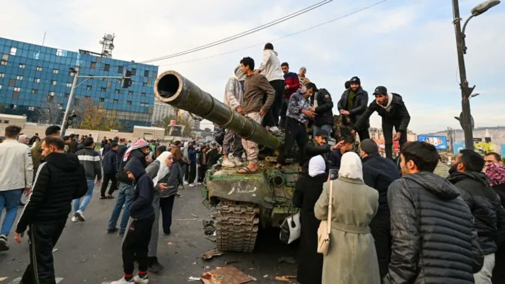 Rebelii sirieni declară că Damascul este „liber” şi prizonierii politici eliberaţi. A început căutarea lui Bashar al-Assad