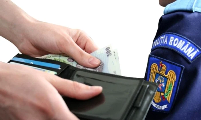 O femeia prinsă băută la volan a dat 1.500 euro mită