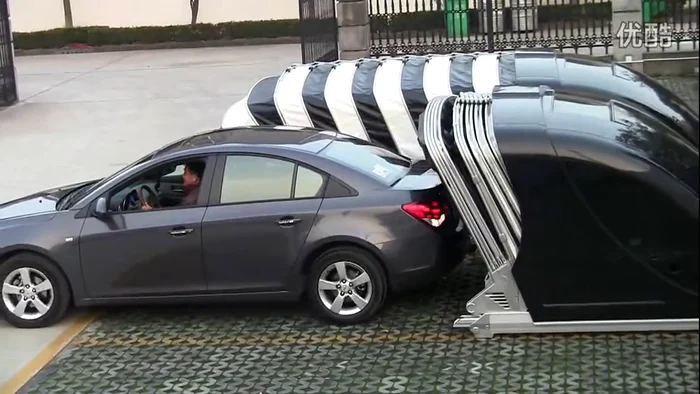 Garajul retractabil e soluţia perfectă pentru cei care vor să îşi protejeze maşina, dar nu vor un garaj convenţionalcaptură video