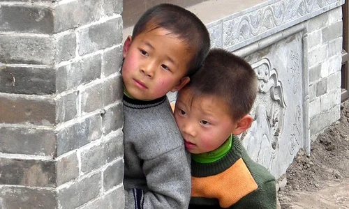 Guvernul de la Beijing crește limita de doi copii per familie jpeg