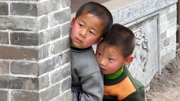 Guvernul de la Beijing crește limita de doi copii per familie jpeg