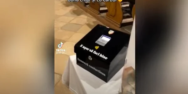 Plata cu cardul la un eveniment caritabil ce a avut loc la o biserica din Cluj png