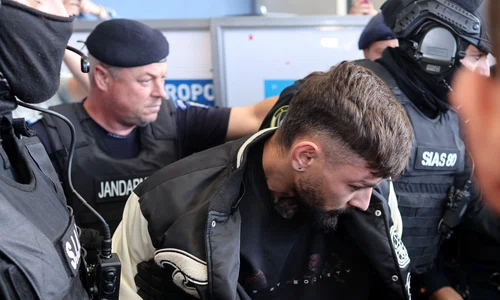 Vlad Baltateanu este escortat de politisti 2