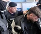 Vlad Baltateanu este escortat de politisti 2
