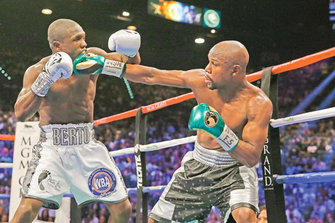 
    Mayweather a câştigat 49 de meciuri la profesioniştiFoto: AP  
