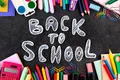 back school background with school supplies chalkboard jpg