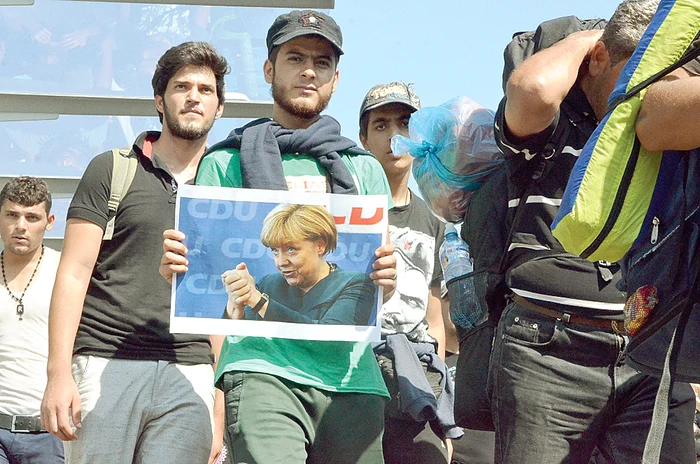 Refugiații așteaptă  ca Angela Merkel  să deschidă porțile Germaniei