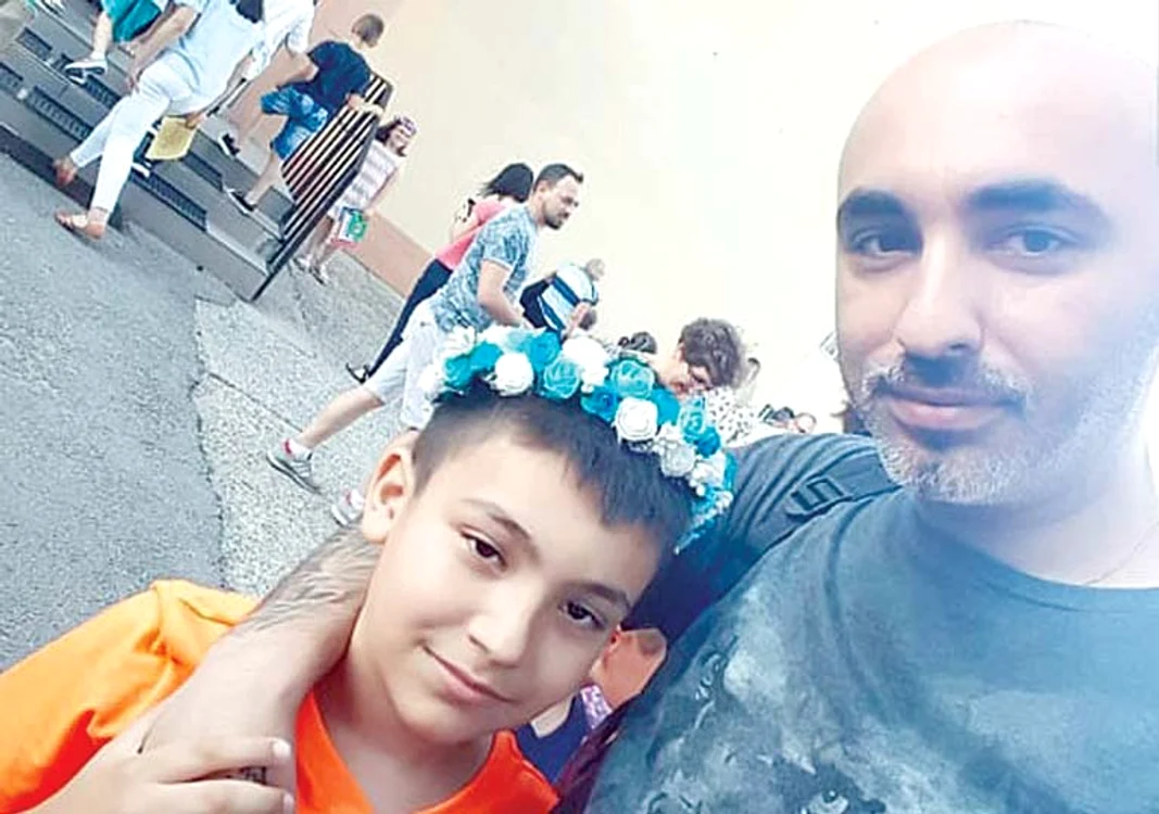 Alături de fiul lui, Nikolas, în vârstă de 9 ani