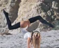 Daisy Lea does splits and other sexy yoga poses on the Beach jpeg