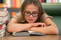 medium shot woman studying library jpg