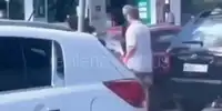 GIF Bataie benzinarie rusia 