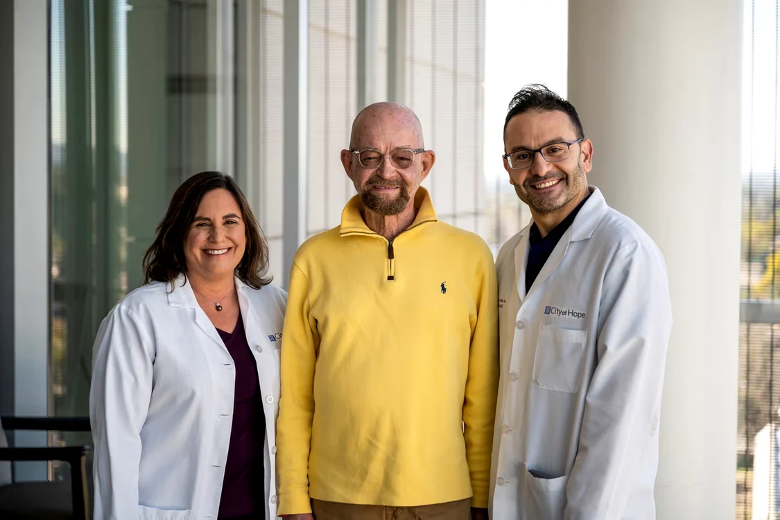 Paul Edmonds (centru) a fost vindecat FOTO: City of Hope