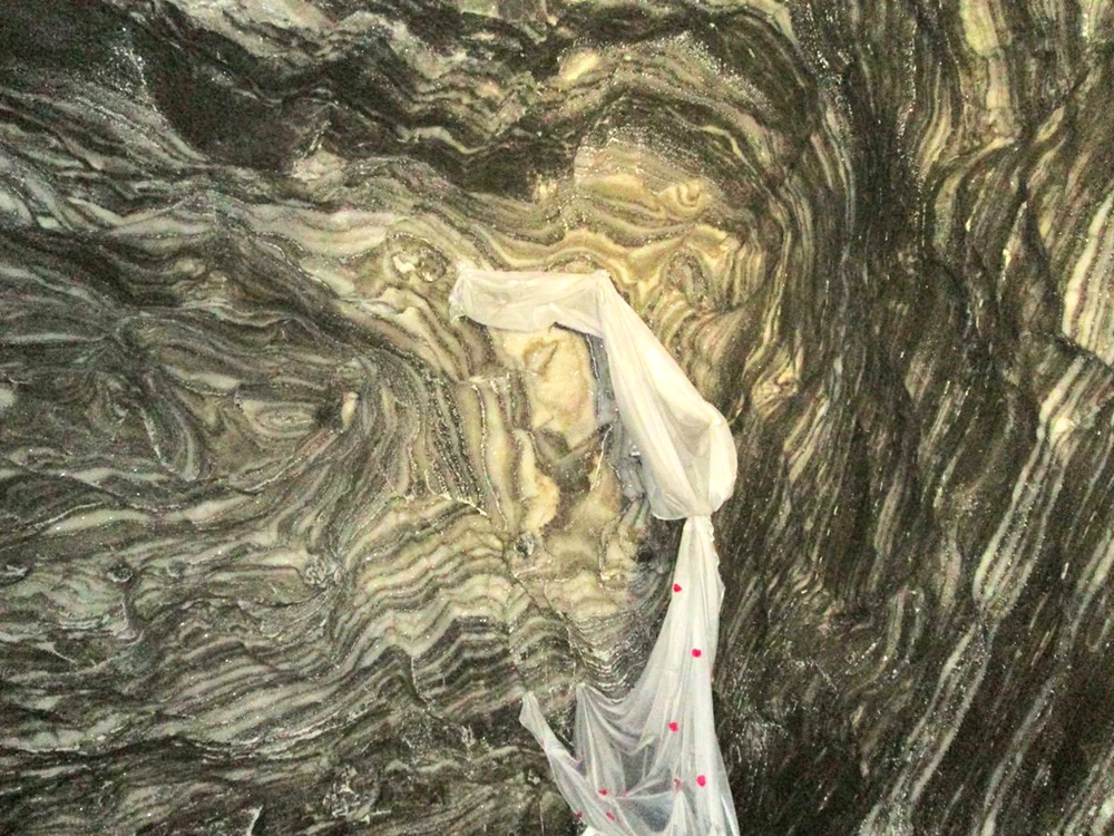 
    Chipul de pe peretele  salinei a fost  descoperit de un miner  