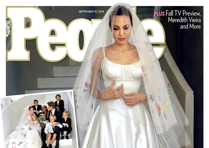 Angelia Jolie şi Brad
Pitt au vândut revistei „Peple“ drepturile asupra fotografiilor de la nuntă
FOTO People Magazine