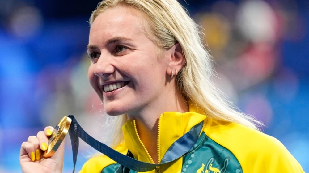 Zguduită de operația care i-a extirpat o tumoare ovariană, o mare înotătoare a lumii se retrage la 25 de ani