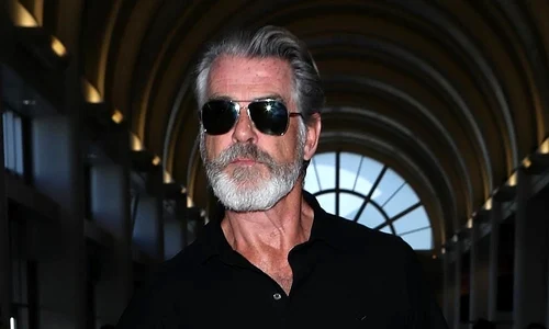 Pierce Brosnan sports a Grizzly GQ look at LAX jpeg