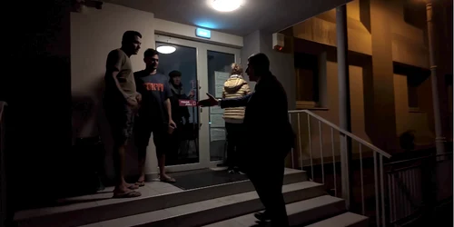 George simion la blocul cu ,,migranti” captura FB Simion png