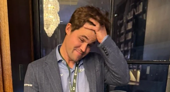 Magnus Carlsen și-a pus mâinile-n cap
