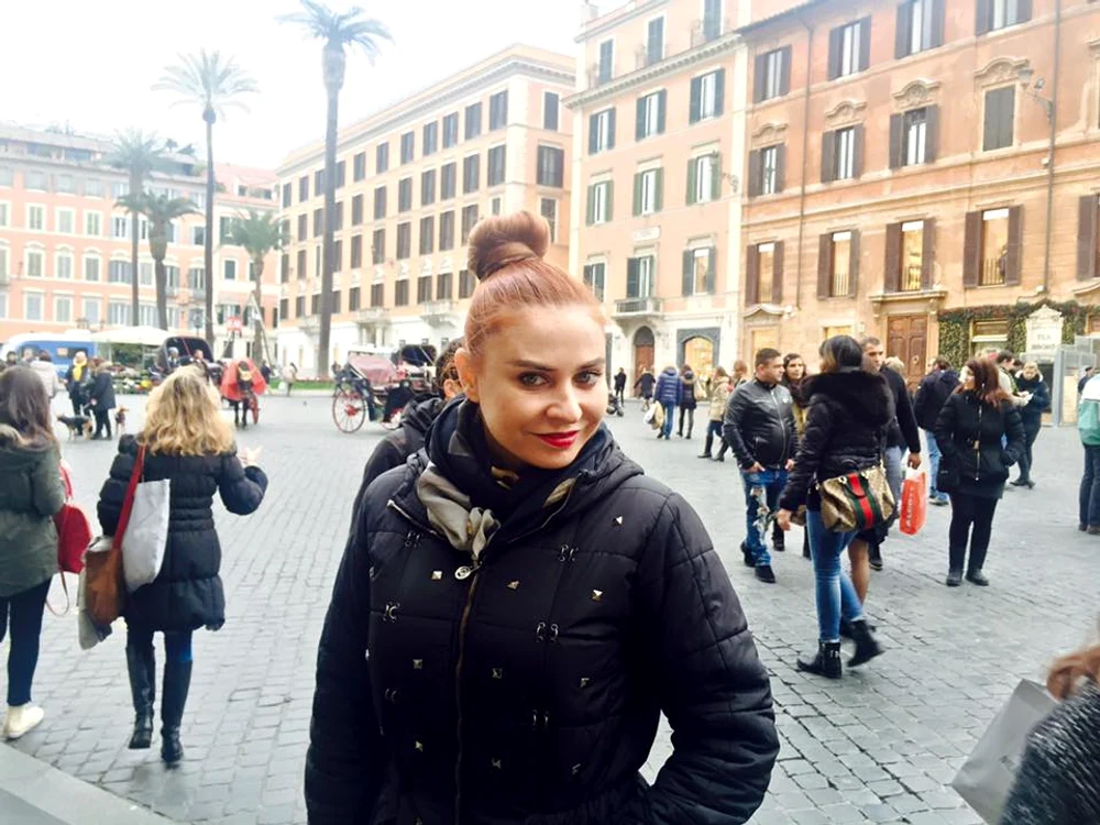 Adina, în Roma. Obișnuia să meargă foarte des în Italia, unde are foarte mulți prieteni și parteneri de afaceri cu care colaborează pentru magazinul ei de haine