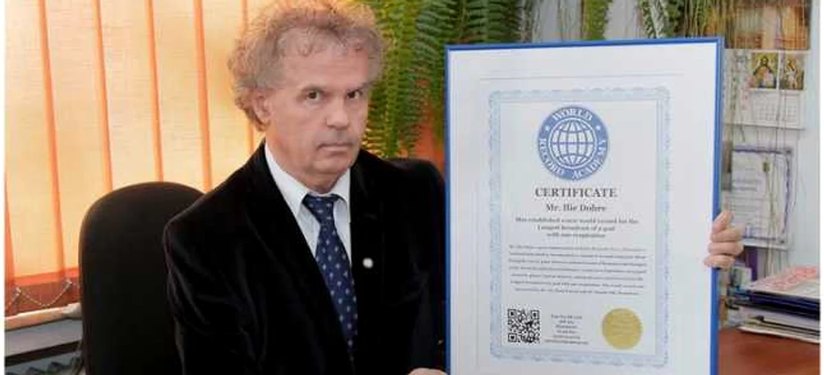 Ilie Dobre și documentul care îi certifică intrarea în Cartea Recordurilor  FOTO Arhiva personală