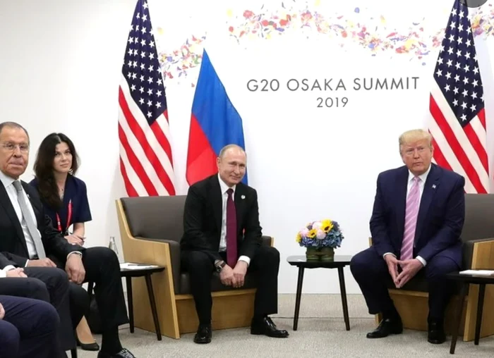 Daria Boiarskaia alături de Putin și Trump, la summitul G20 de la Tokyo din 2019. Foto: Getty Images