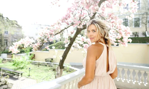 mysterious blond girl white dress looks her shoulder jpg