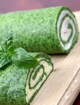 8043682 gourmet spinach rolls one with eggs and cheese second one with garlic cheese and ham shallow dof jpeg