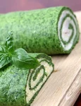 8043682 gourmet spinach rolls one with eggs and cheese second one with garlic cheese and ham shallow dof jpeg