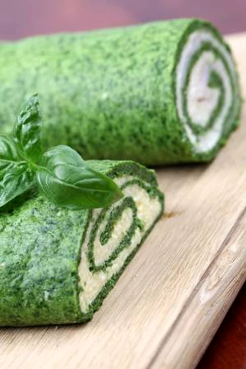 8043682 gourmet spinach rolls one with eggs and cheese second one with garlic cheese and ham shallow dof jpeg