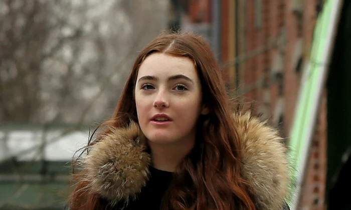 Actress Julianne Moore's spitting image daughter Liv Freundllich and her father, director Bart Freundlich, visit the set of 'Life Itself' filming on 6th Avenue in Greenwich Village in New York City jpeg