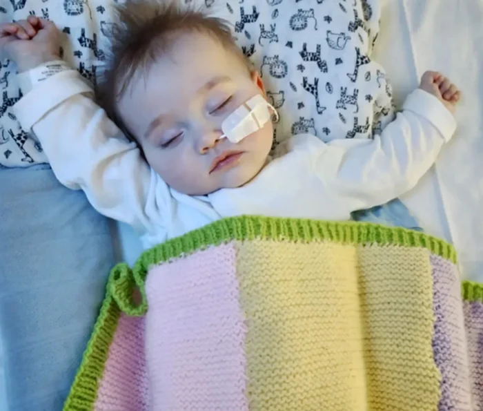 Bebelușul Thomas paralizase complet din cauza unei toxine rare. Sursă foto: BBC/Arhiva familiei