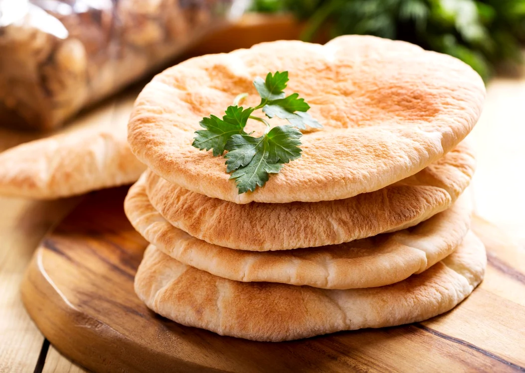 37193281   pita bread on wooden board jpeg
