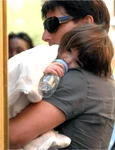 Tom Cruise și Katie Holmes cu fiica lor, Suri  foto   Shutterstock jpg