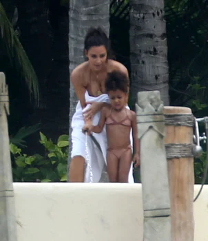 Kim Kardashian & Kids Enjoy A Day Poolside In Mexico jpeg
