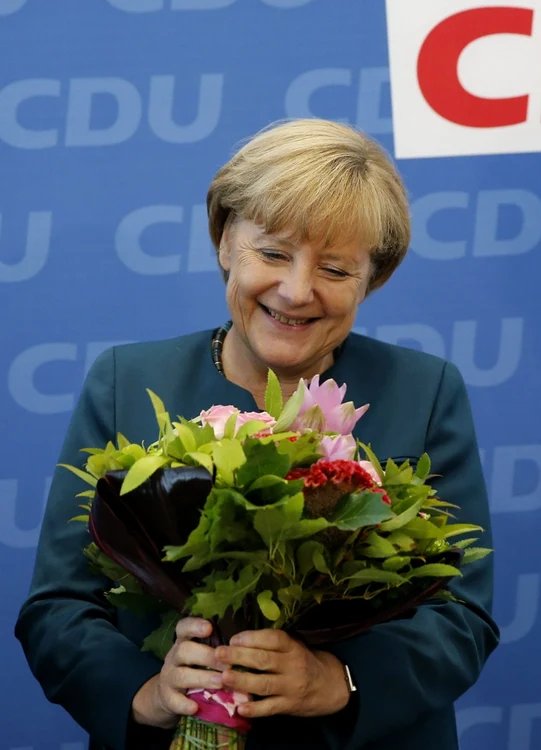 Merkel a jurat, după aflarea rezultatelor, că va aduce „mulţi ani de succes” Germaniei. FOTO Reuters