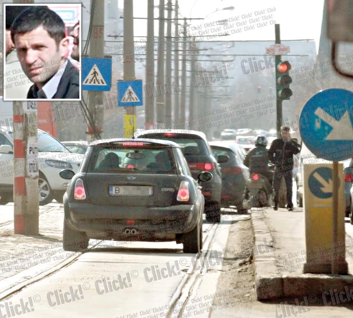 A depăşit coloana maşinilor ce staţionau la semafor şi a trecut prin stânga refugiului de tramvai