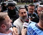 Ionel Rusen este escortat de polițiști la sediul DIICOT din București, 21 septembrie 2026. Inquam Photos / George Călin