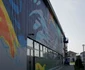 Pictura uriaşă de pe sala de sport din Dumbrăviţa