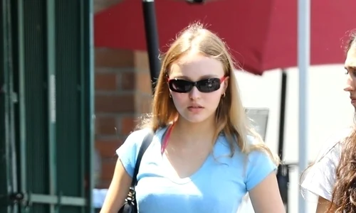 *EXCLUSIVE* Lily Rose Depp opts for a swimsuit for a bra while shopping for groceries with a friend jpeg
